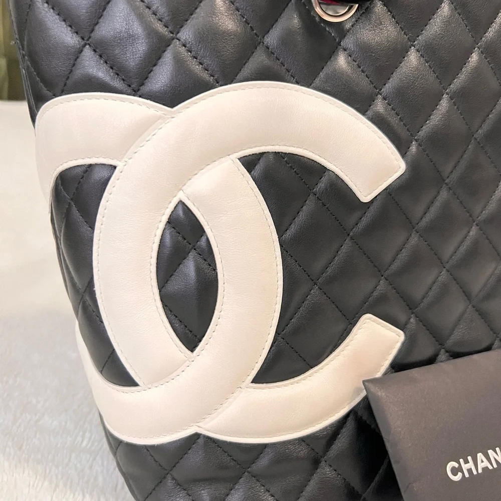 CHANEL Black Quilted Leather Shoulder Tote with White CC Emblem